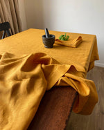 Load image into Gallery viewer, Tablecloth from soft linen in Safran
