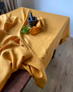 Load image into Gallery viewer, Tablecloth from soft linen in Safran
